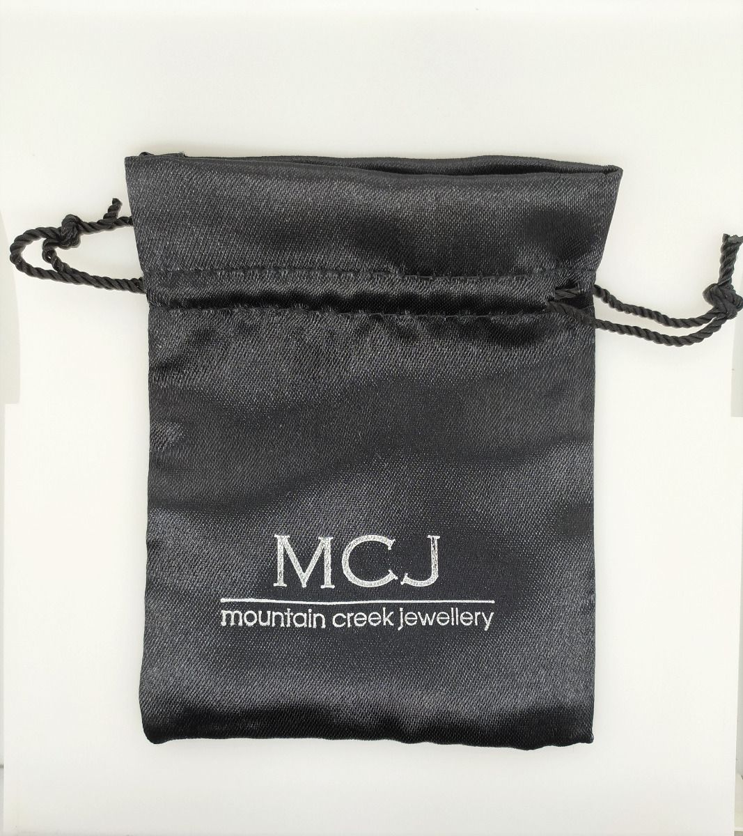 MCJ BLACK SATIN POUCHES